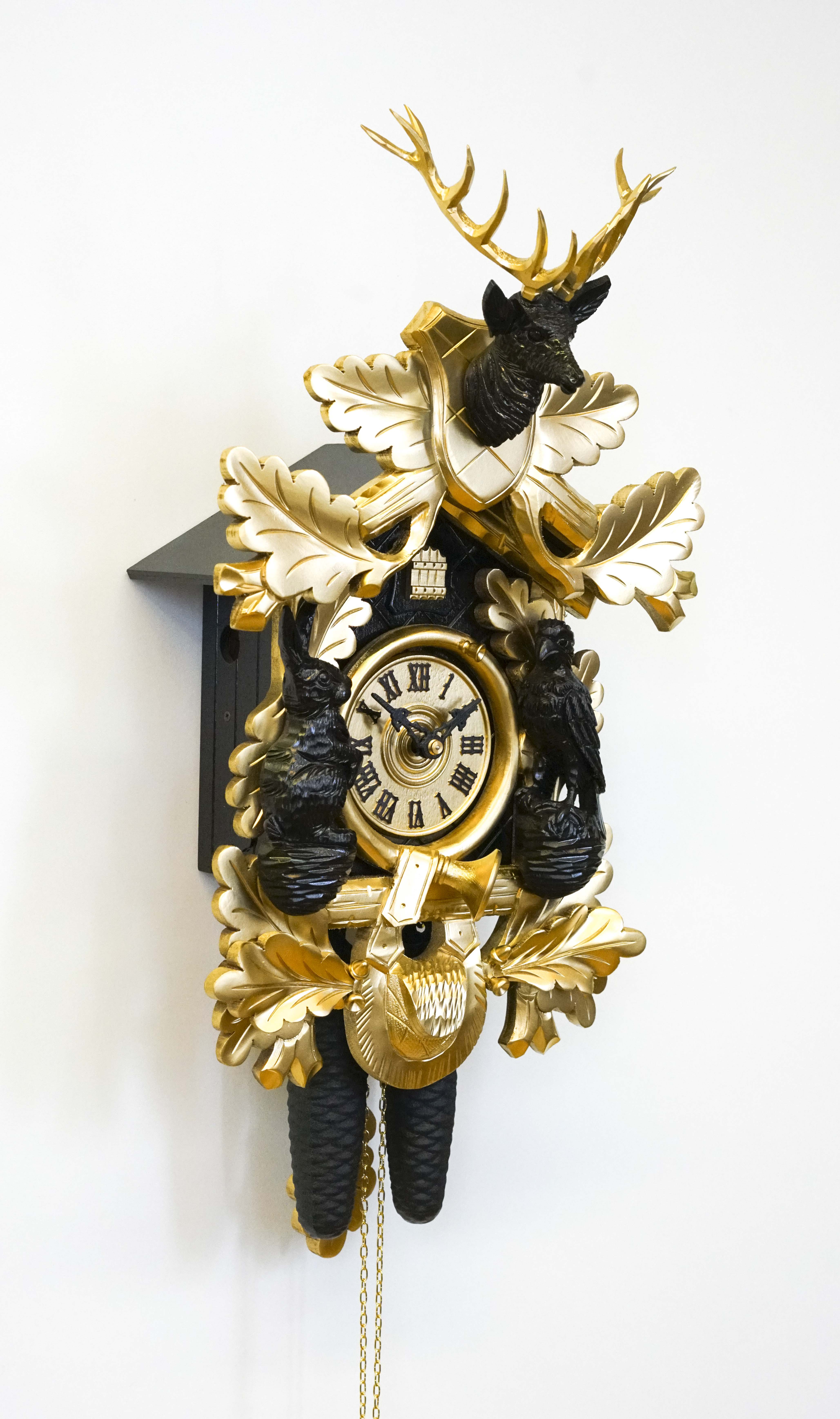 Kuckucksuhr gold/schwarz (Serie)