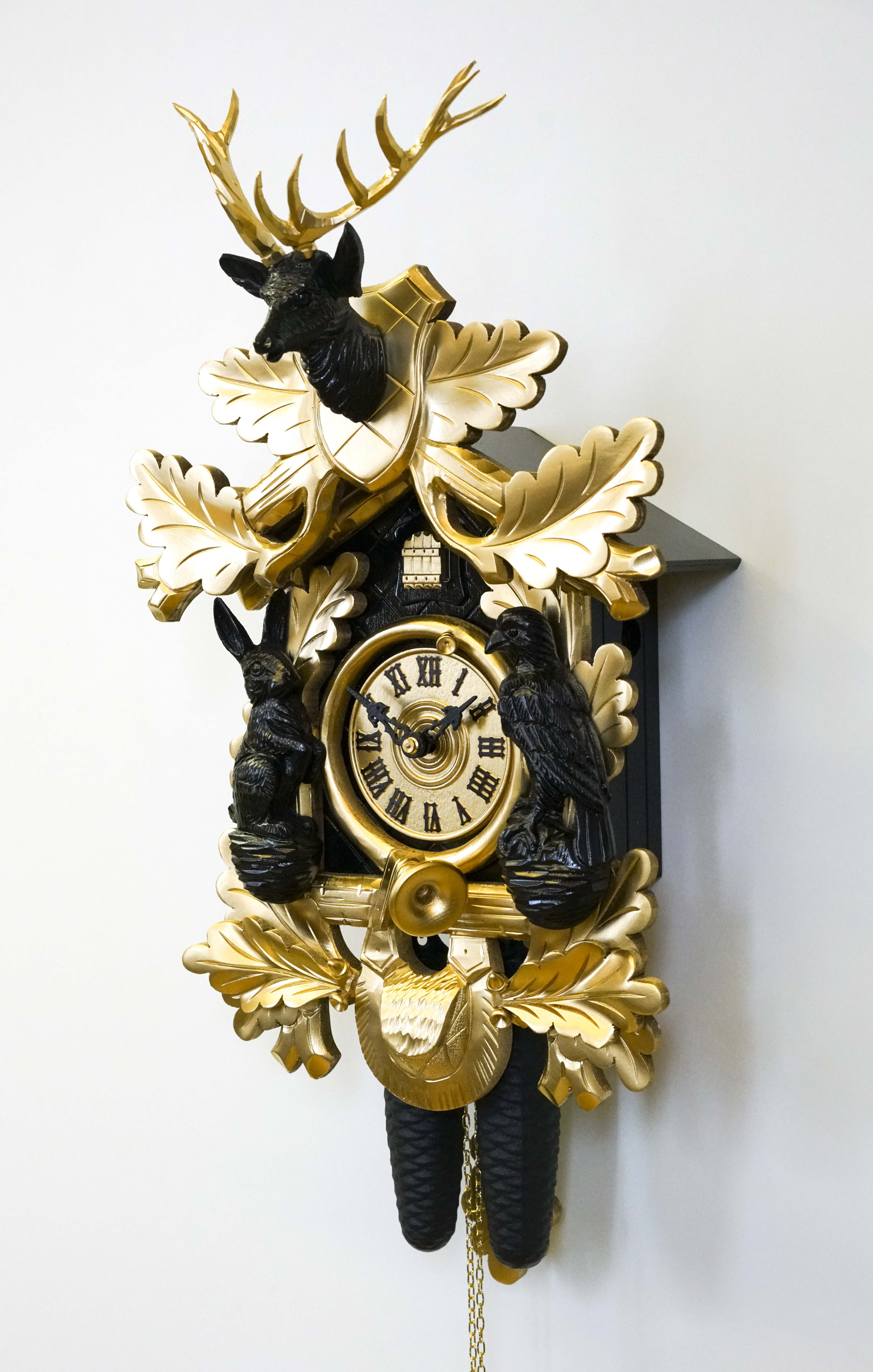Kuckucksuhr gold/schwarz (Serie)