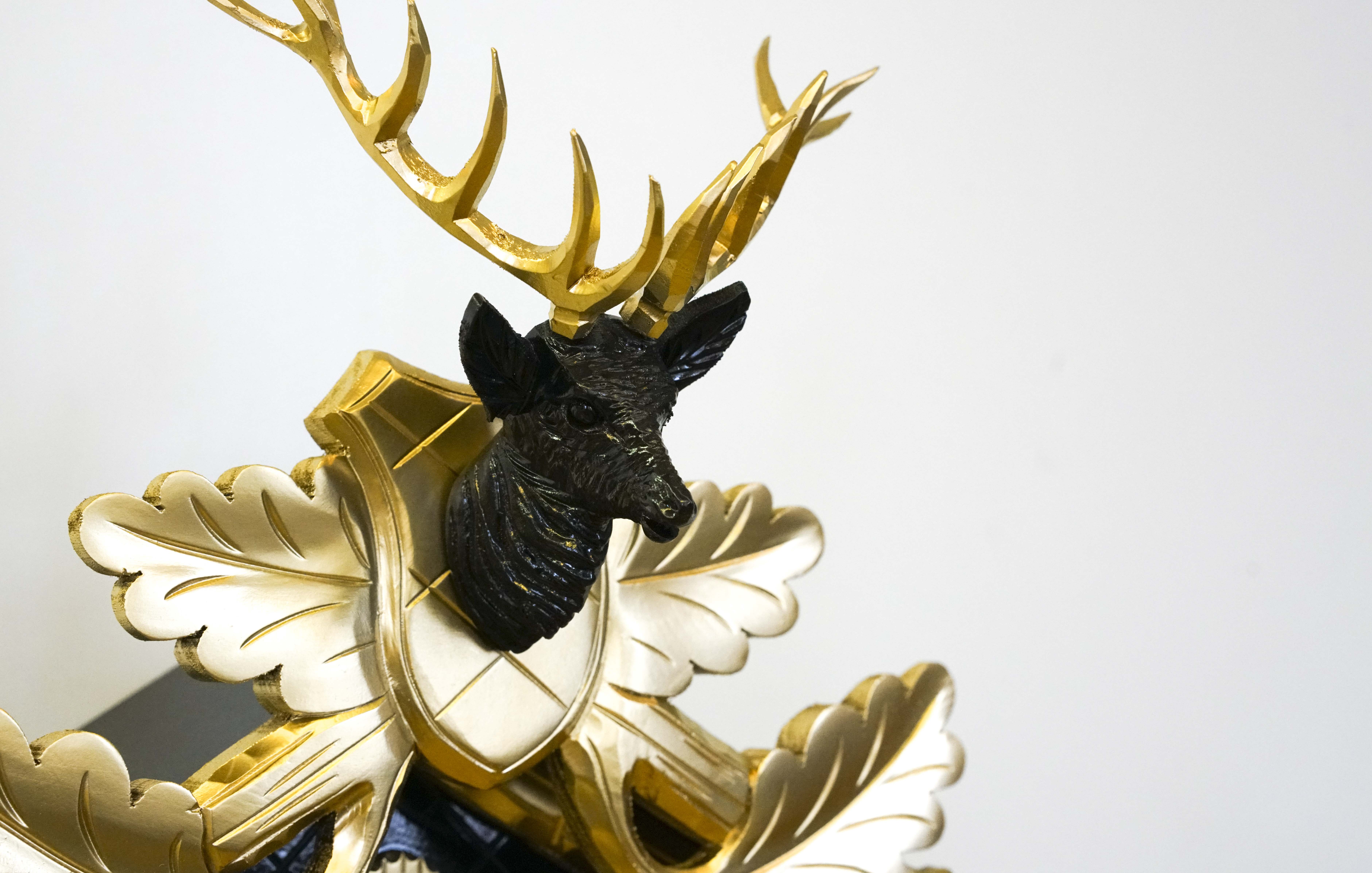 Kuckucksuhr gold/schwarz (Serie)